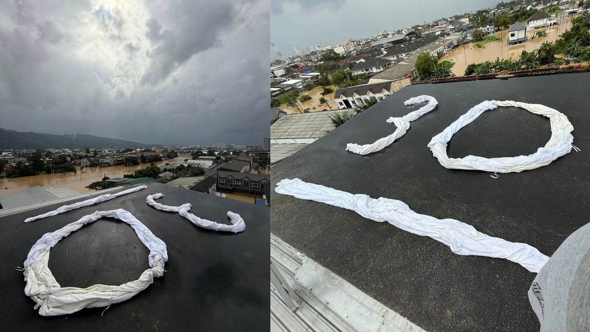 Hat Yai resident stranded over 3 days signals authorities with cloth for rescue