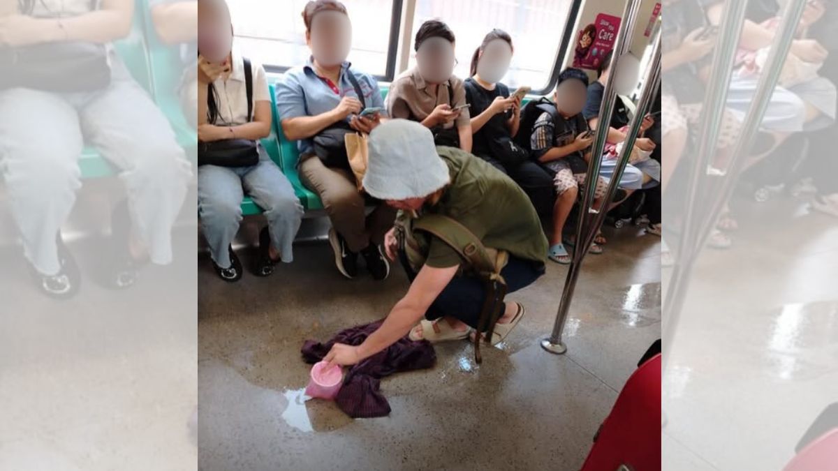 Man uses his spare t-shirt to clean up another passenger’s spilt drink on MRT, earning praise online