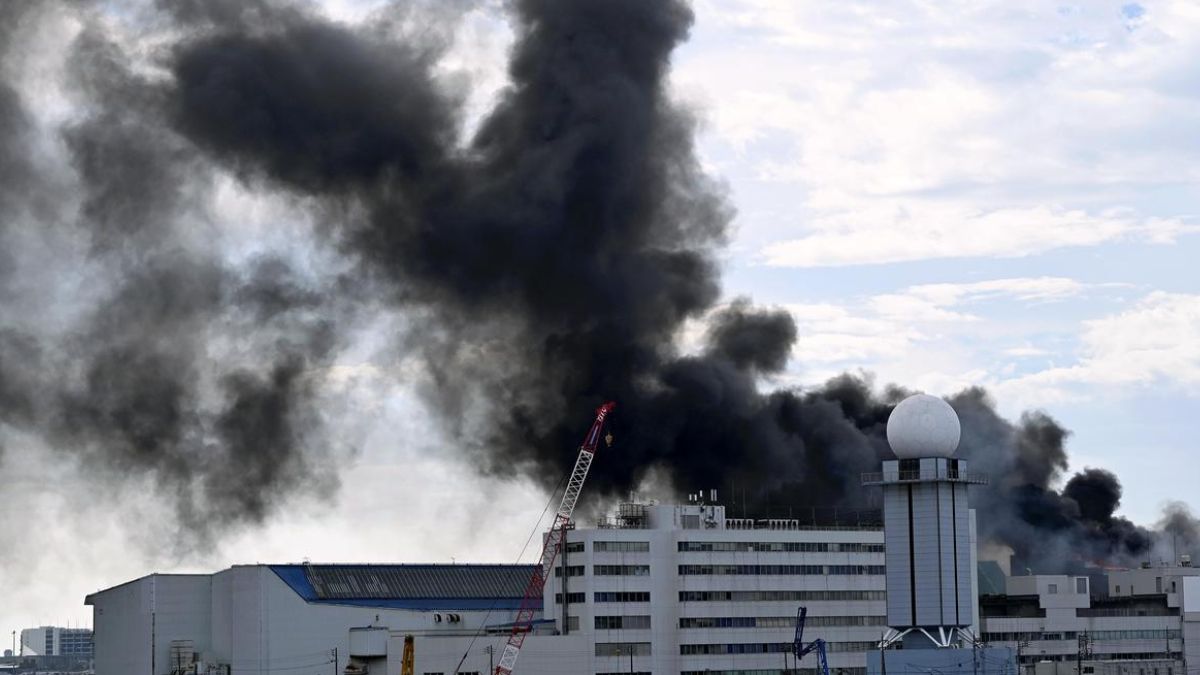 Fire at Japan’s Haneda Airport demolition site sends black smoke into Tokyo sky