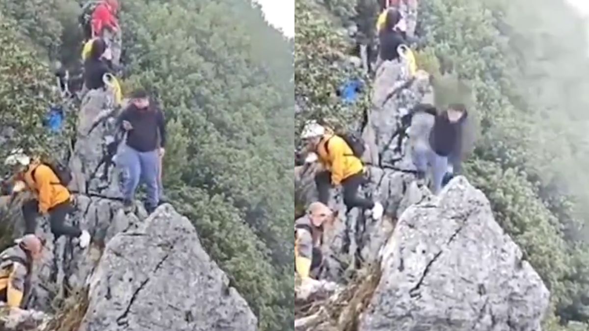 Tourist survives dramatic 130ft cliff fall while taking selfie in China